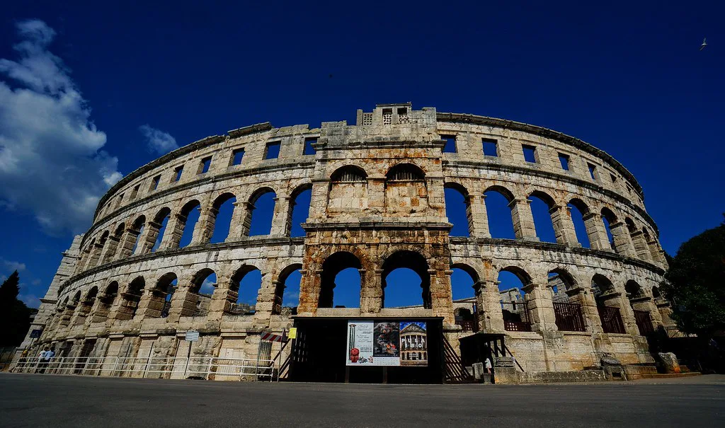 The outer stone arcades of the Roman amphitheatre in Pula.