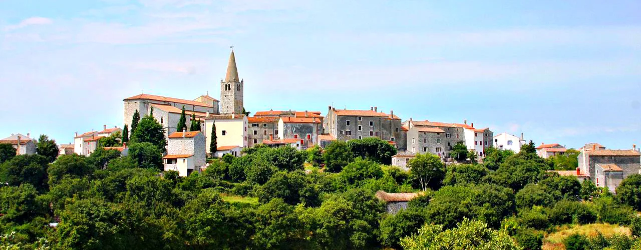 Houses and a bell tower on the hilltop old town of Bale in Istria