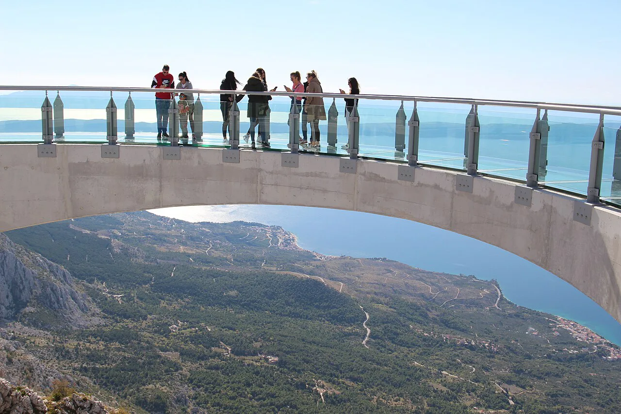 Visitors on the horseshoe-shaped Biokovo Skywalk high above the coast, Dalmatia