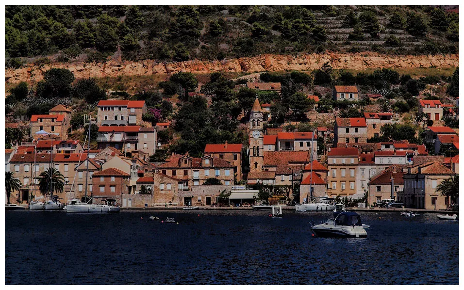 A harbour town on the island of Vis seen from the water