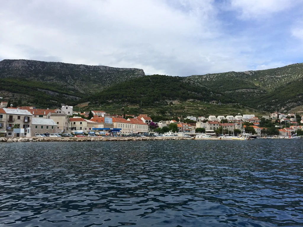 The town of Bol below green hills on the island of Brač