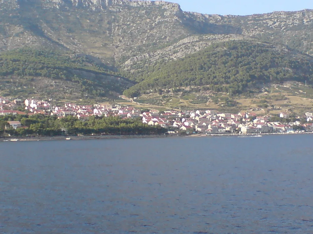 The town of Bol below green hills on the island of Brač