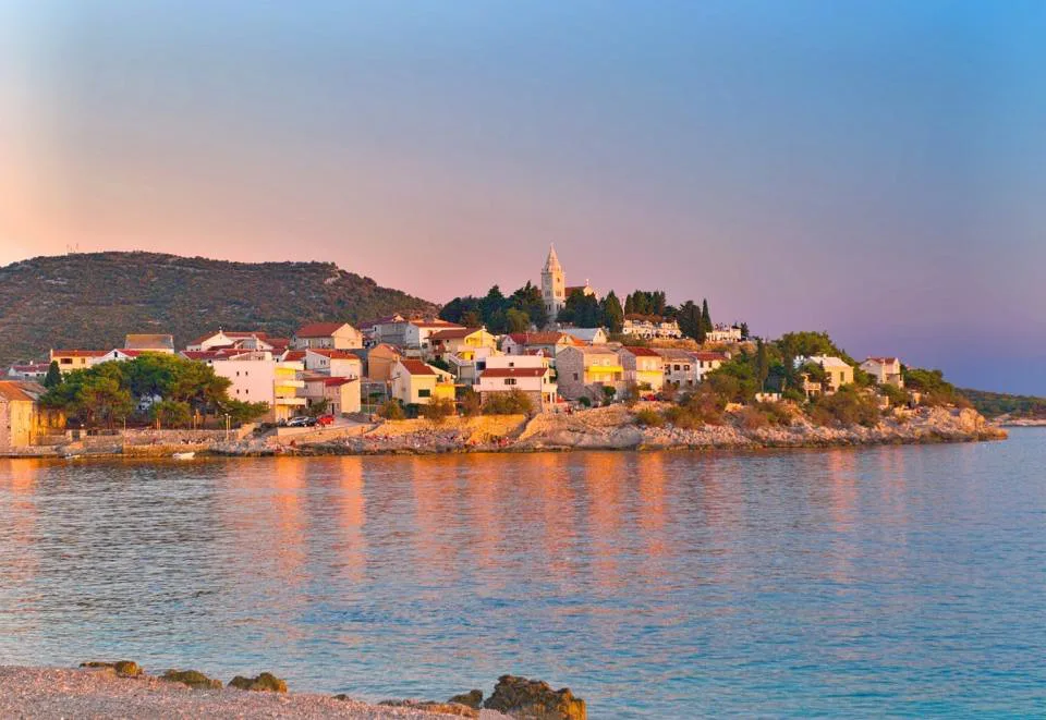 The old town of Primošten on its small peninsula at sunset, Croatia