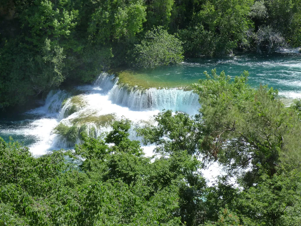 Waterfalls among the trees in Krka National Park.