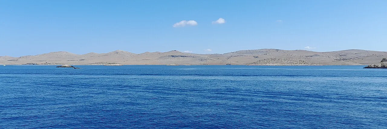 Open sea and low bare islands in Kornati National Park, north of Rašip Mali.