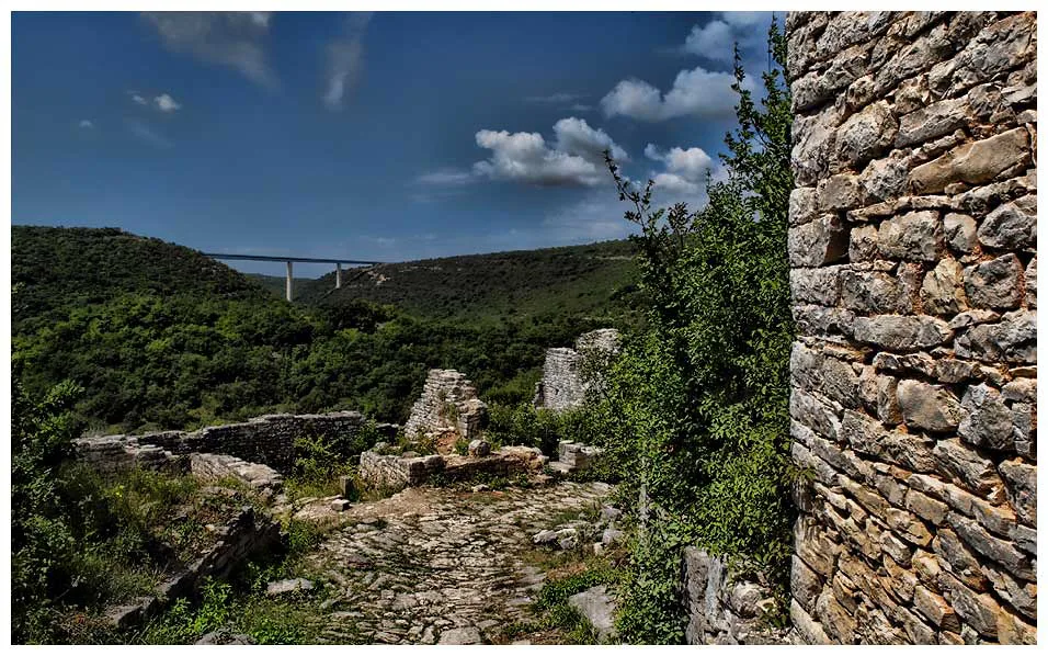 Crumbling stone walls of the abandoned medieval town of Dvigrad in Istria