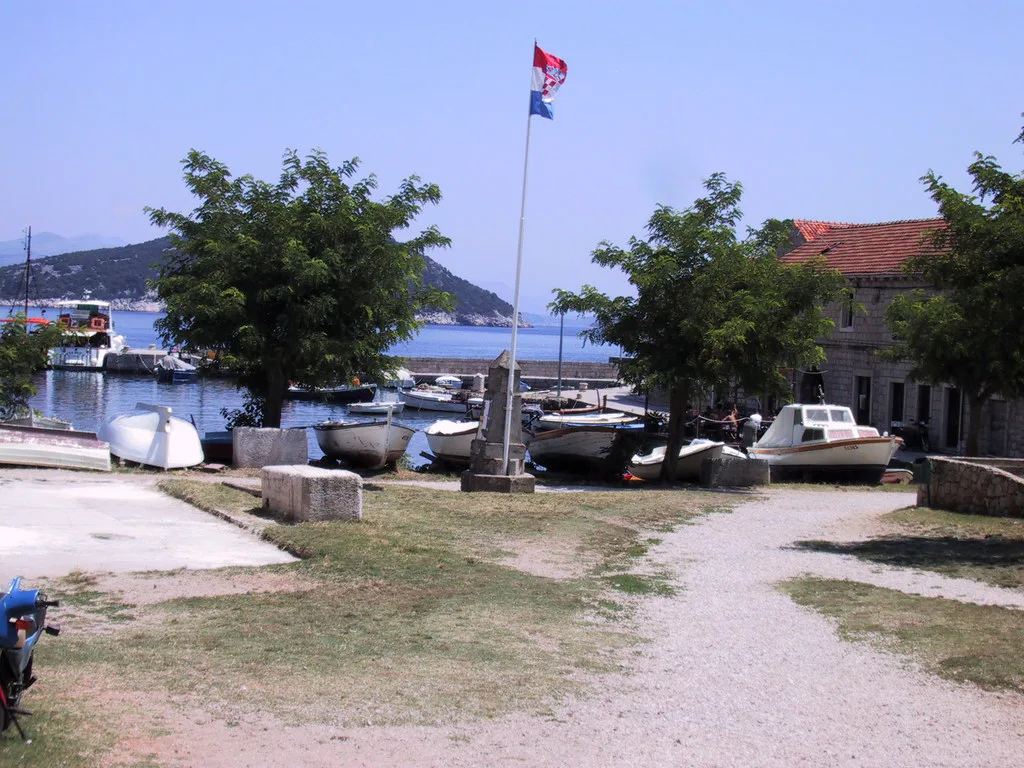 A path leading to small boats moored in the harbour on Lopud, Southern Dalmatia