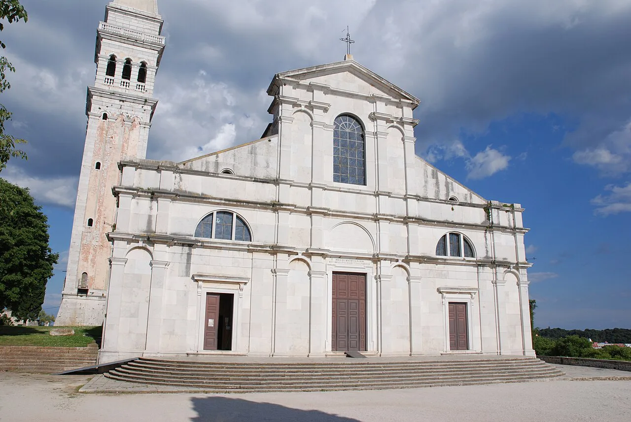 The white façade and bell tower of St Euphemia's Church in Rovinj