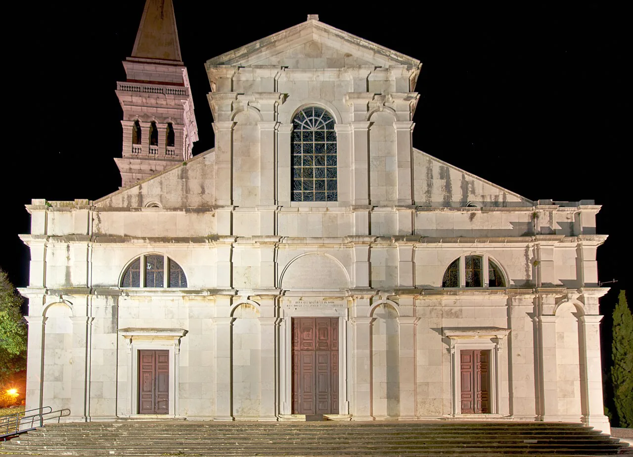 The west façade of the Church of St Euphemia in Rovinj, lit at night