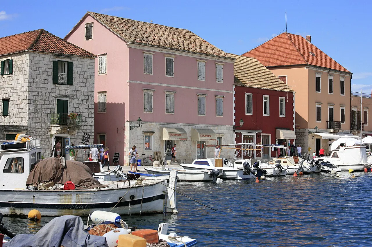 Colourful houses and small boats along the harbour in Stari Grad on Hvar
