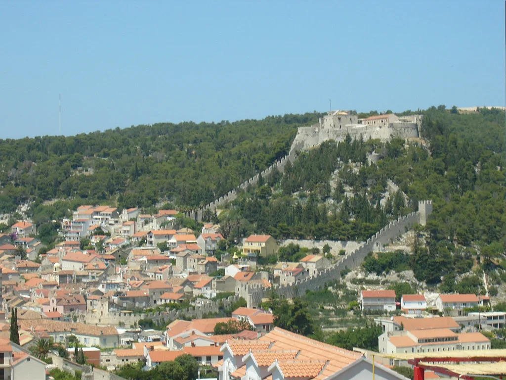 The fortress on the wooded hill above the red rooftops of Hvar Town