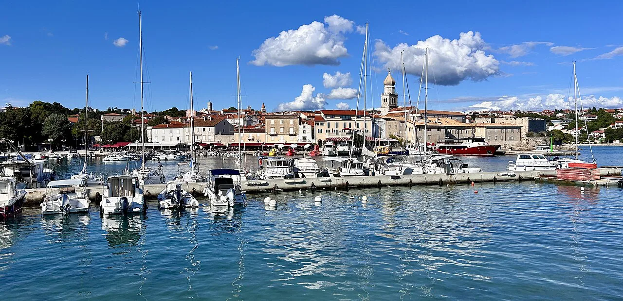 Boats in the marina in front of the old town of Krk, Kvarner