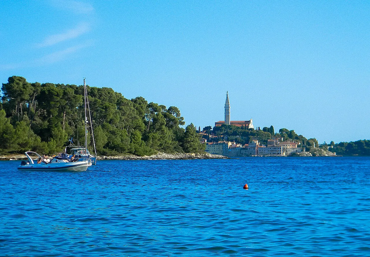 A view across the sea to Rovinj old town from Figarola beach