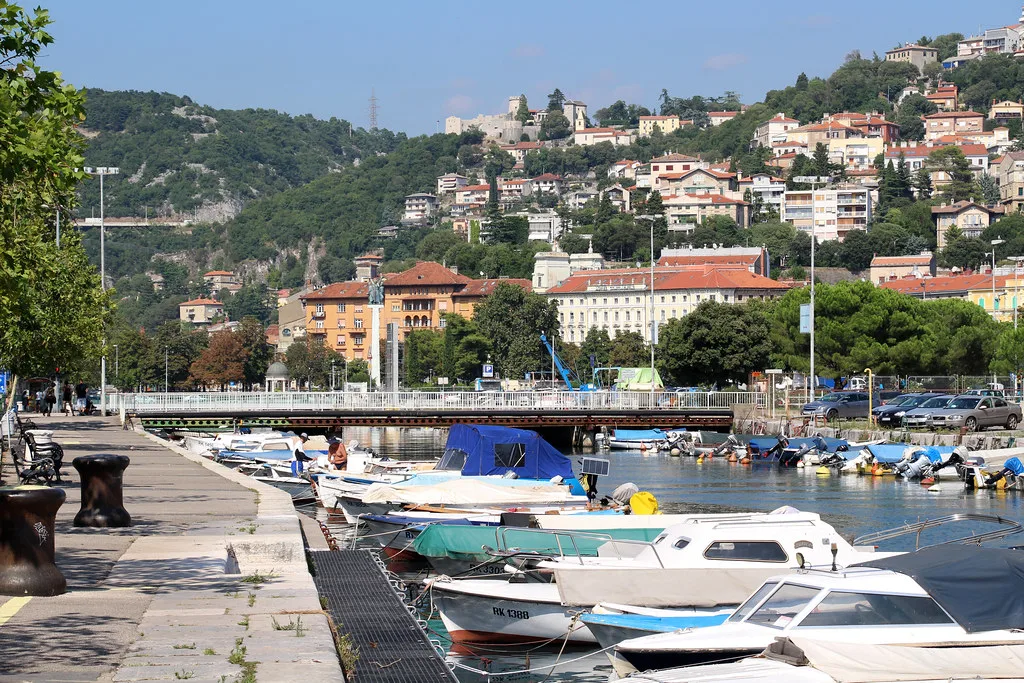 Boats moored along the Mrtvi kanal channel in the Delta area of Rijeka