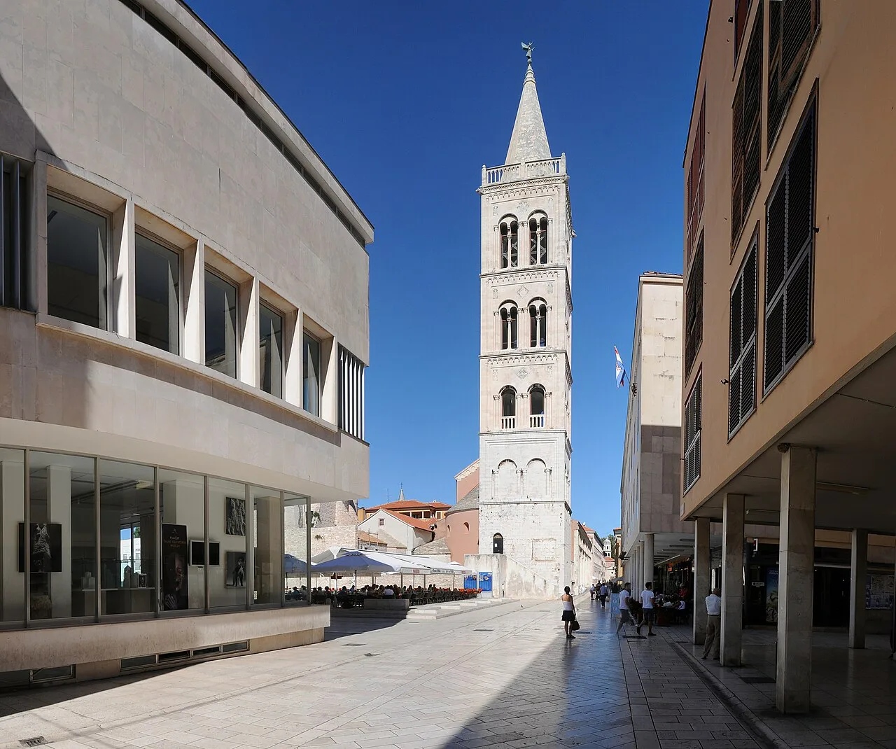 The bell tower of St Anastasia's Cathedral rising above a street in Zadar