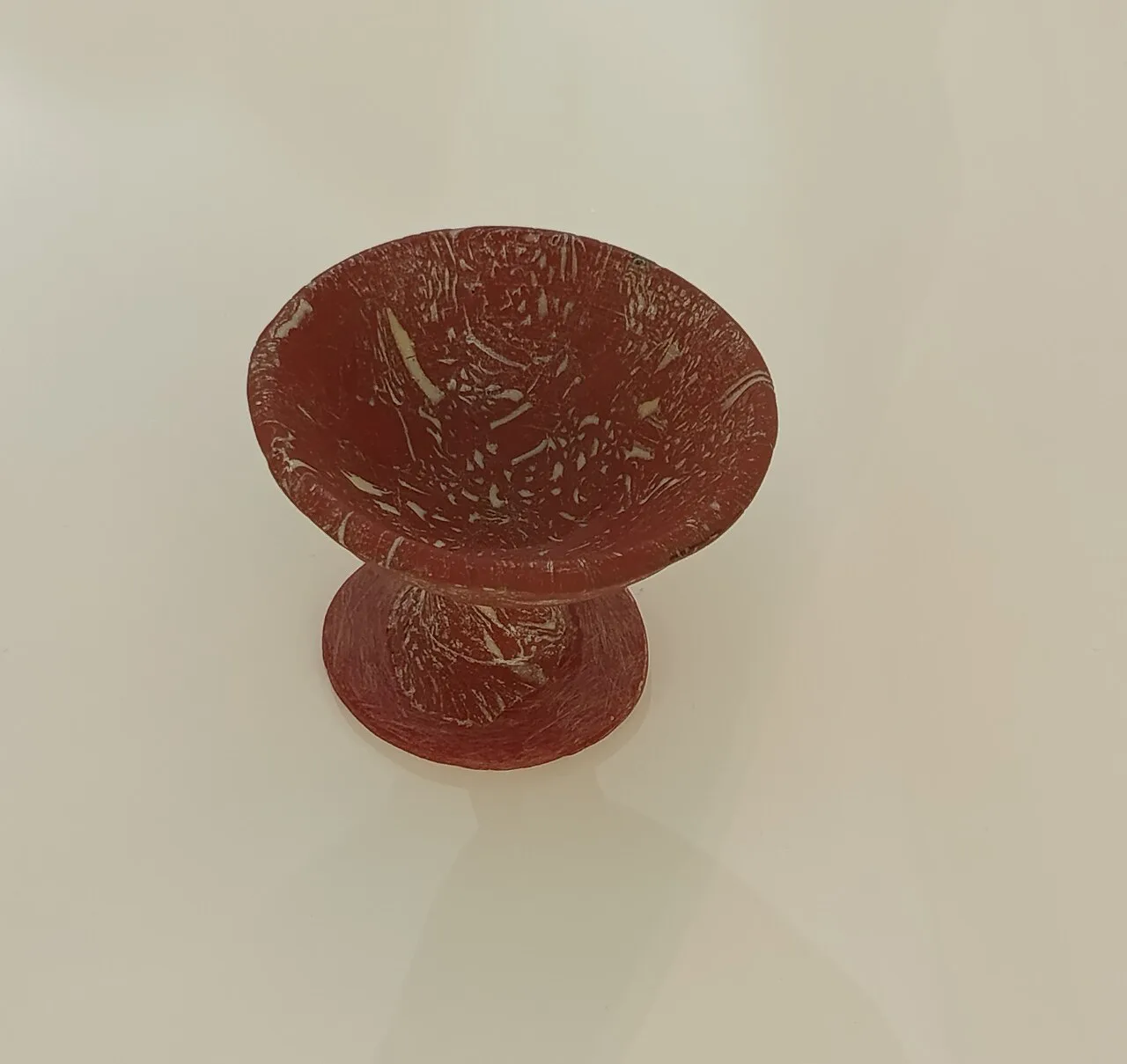 A red Roman glass cup from the first century AD in Zadar's Museum of Ancient Glass, Zadar