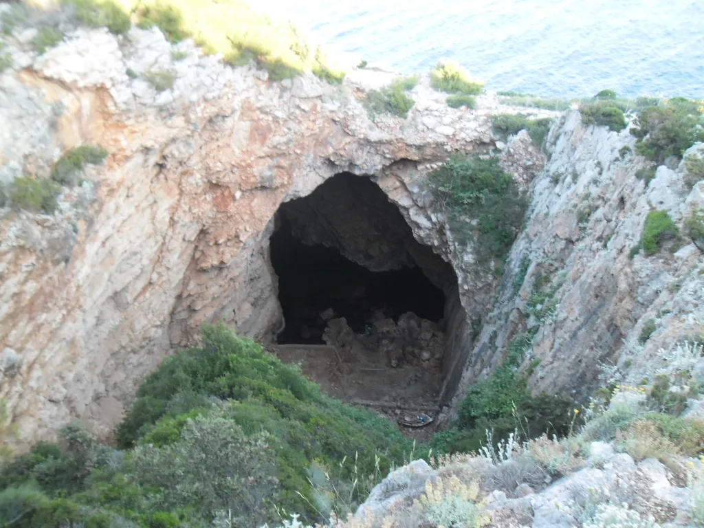 The mouth of Odysseus Cave in the rocky cliffs of Mljet island, Croatia