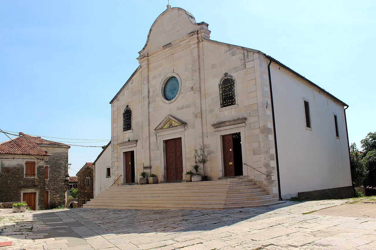 The Church of St George on a stone-paved square in Oprtalj, Istria