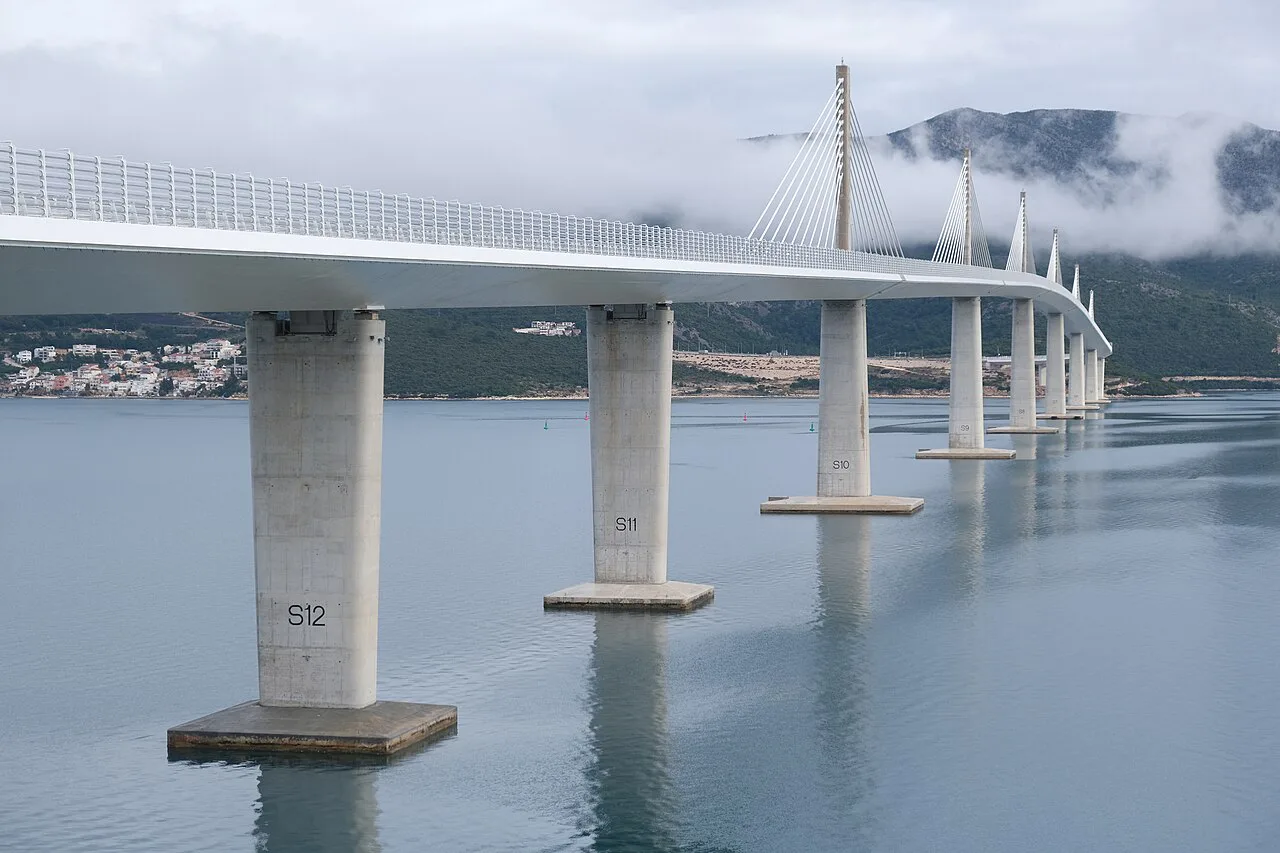The cable-stayed Pelješac Bridge crossing the sea on tall concrete pillars, Southern Dalmatia