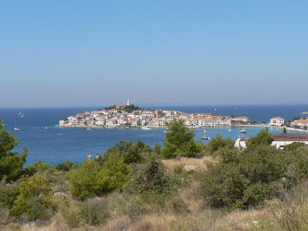 The old town of Primošten on its peninsula seen from the hillside, Dalmatia