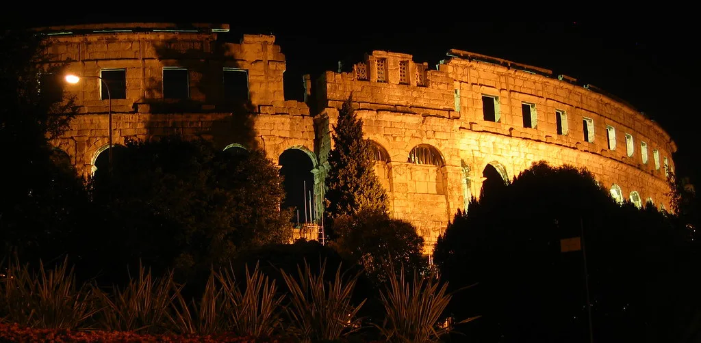 The Roman amphitheatre in Pula lit up at night