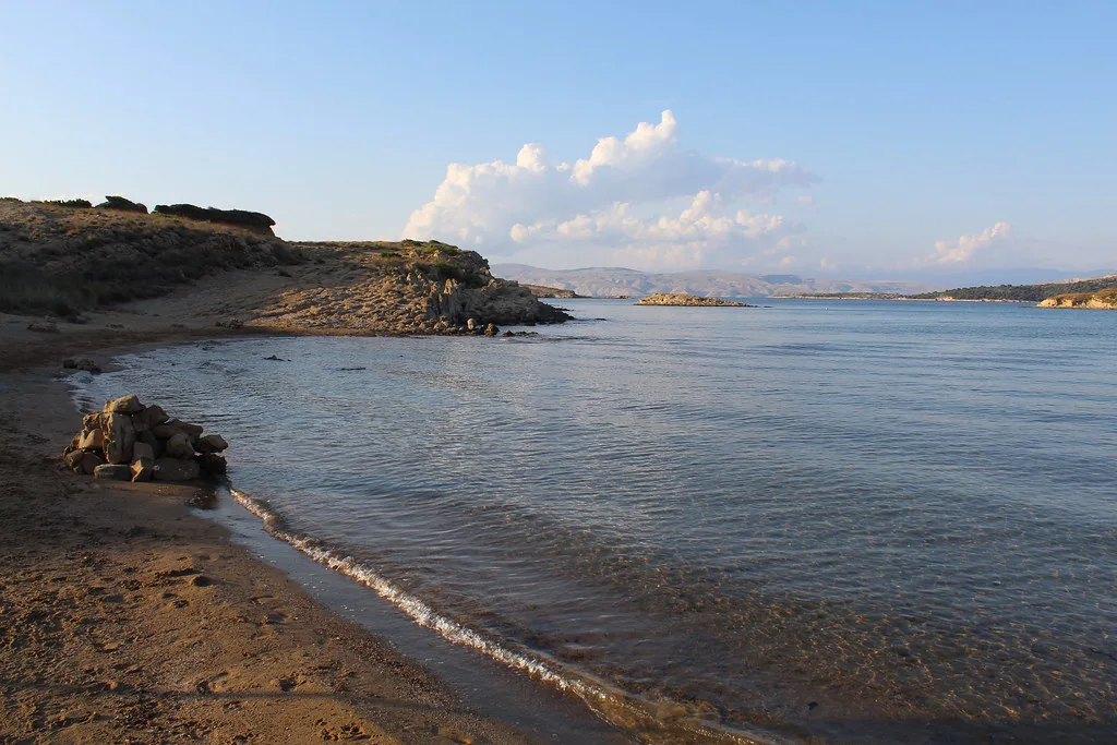 A sandy beach with shallow water near Lopar on the island of Rab, Kvarner