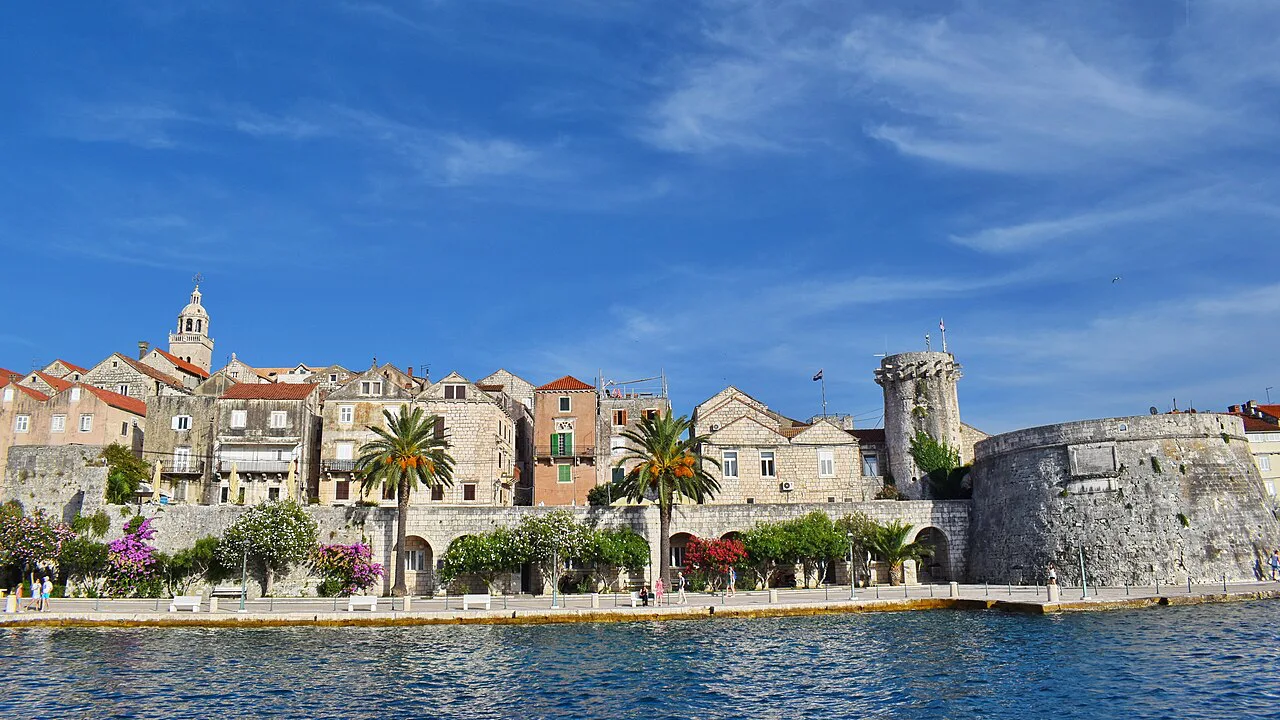Waterfront houses and the round defence towers of Korčula Town.