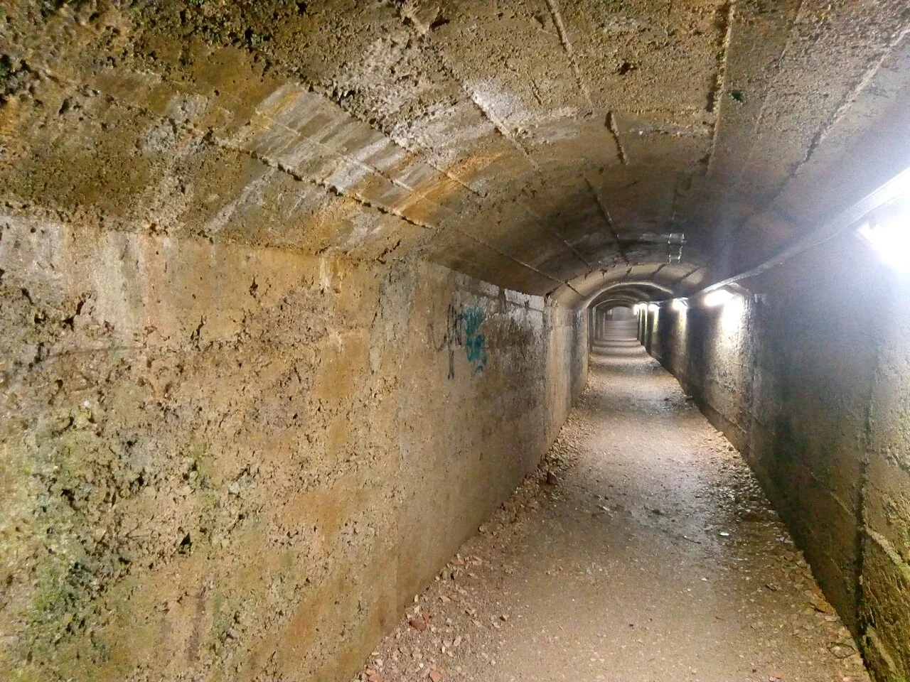 The stone-lined passage of the Rijeka Tunnel beneath the old town.