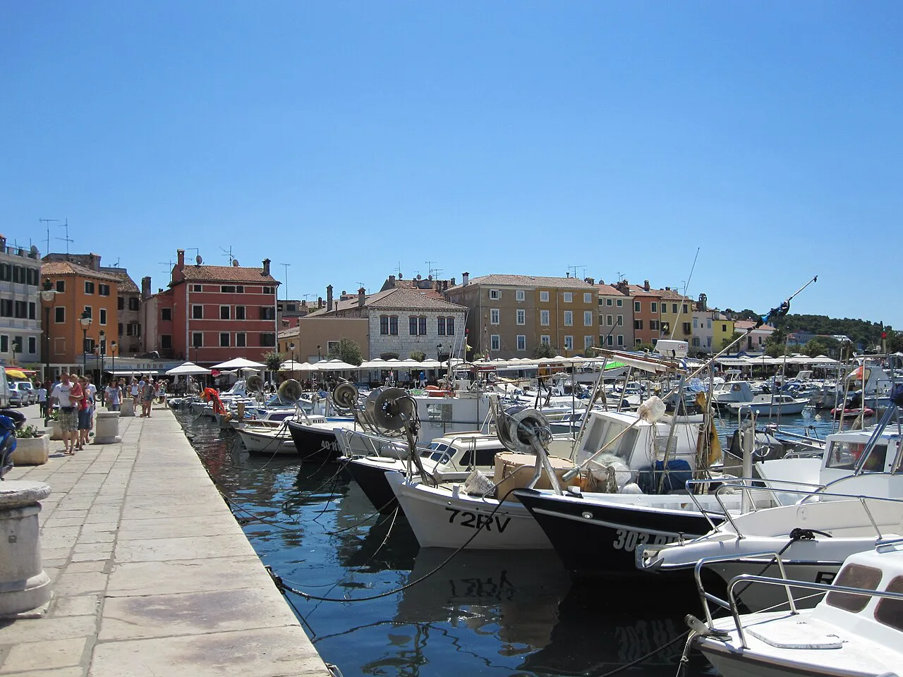 Boats moored along the quay of Rovinj harbour