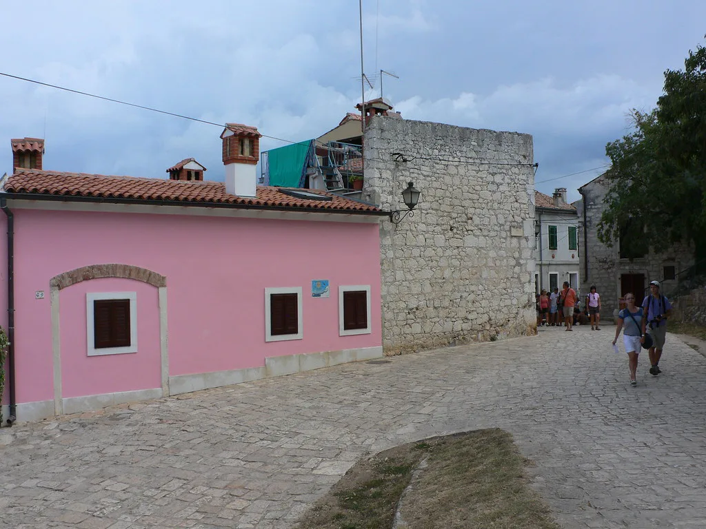A pink house on a cobbled street in the old town of Rovinj