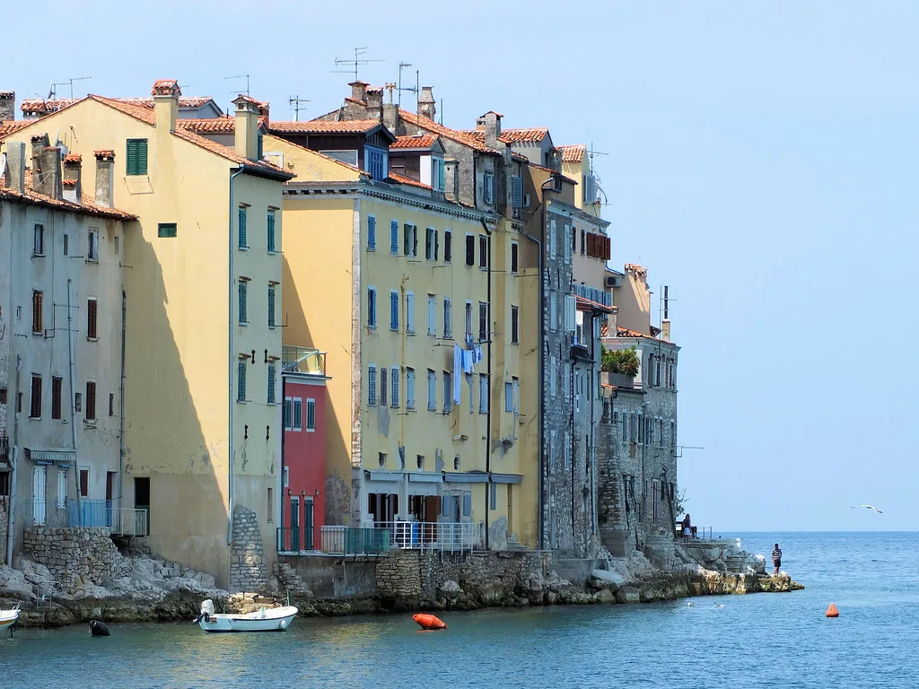 Colourful houses rising straight from the sea in the old town of Rovinj