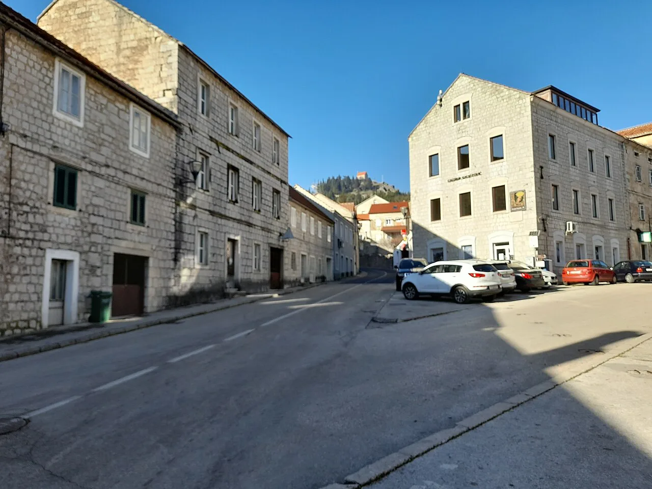 A street lined with stone buildings in the centre of Sinj, Dalmatia