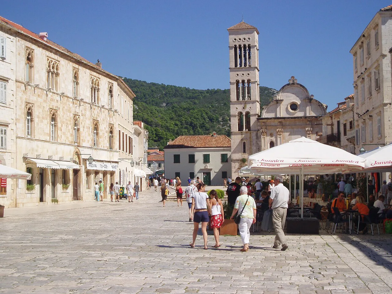 The main square in Hvar Town with the cathedral bell tower behind