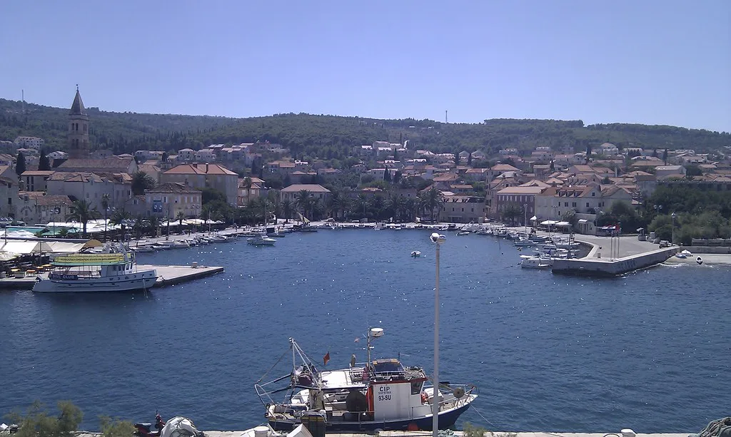 The harbour and waterfront of Supetar seen from the ferry, Brač
