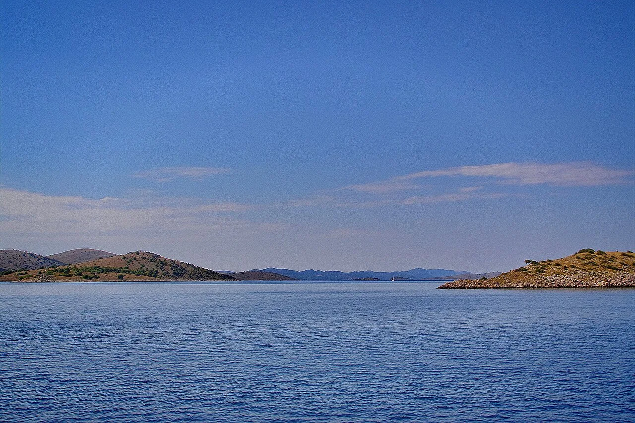Low islands and calm sea in Telašćica Nature Park.