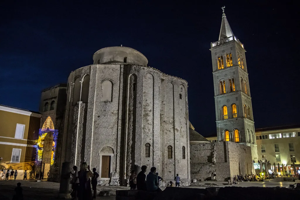 St Donatus' Church and the cathedral bell tower in Zadar at night.