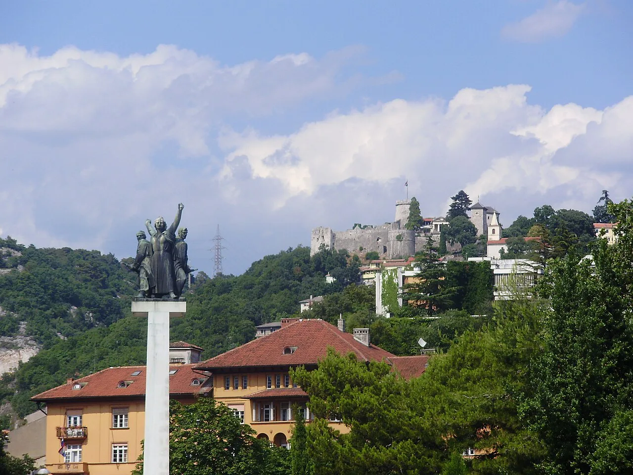 Trsat Castle on its wooded hill above houses in Rijeka