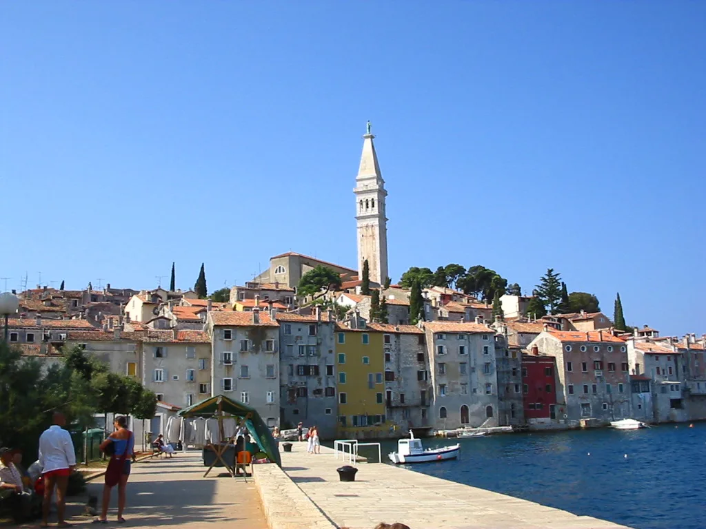 Rovinj old town and its bell tower seen from the Valdibora waterfront.