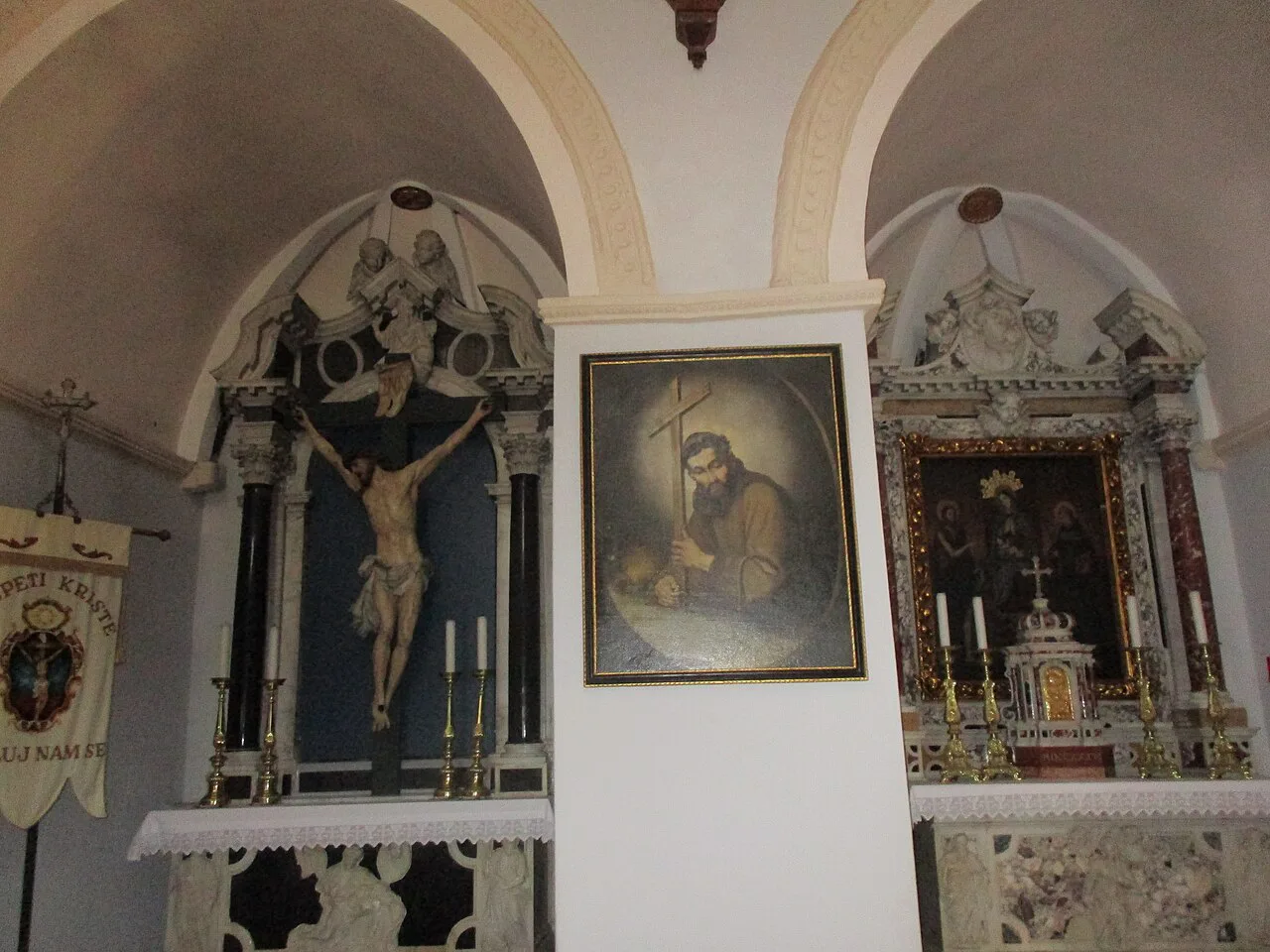 Altars and a crucifix inside the church of the Visovac monastery, Krka National Park