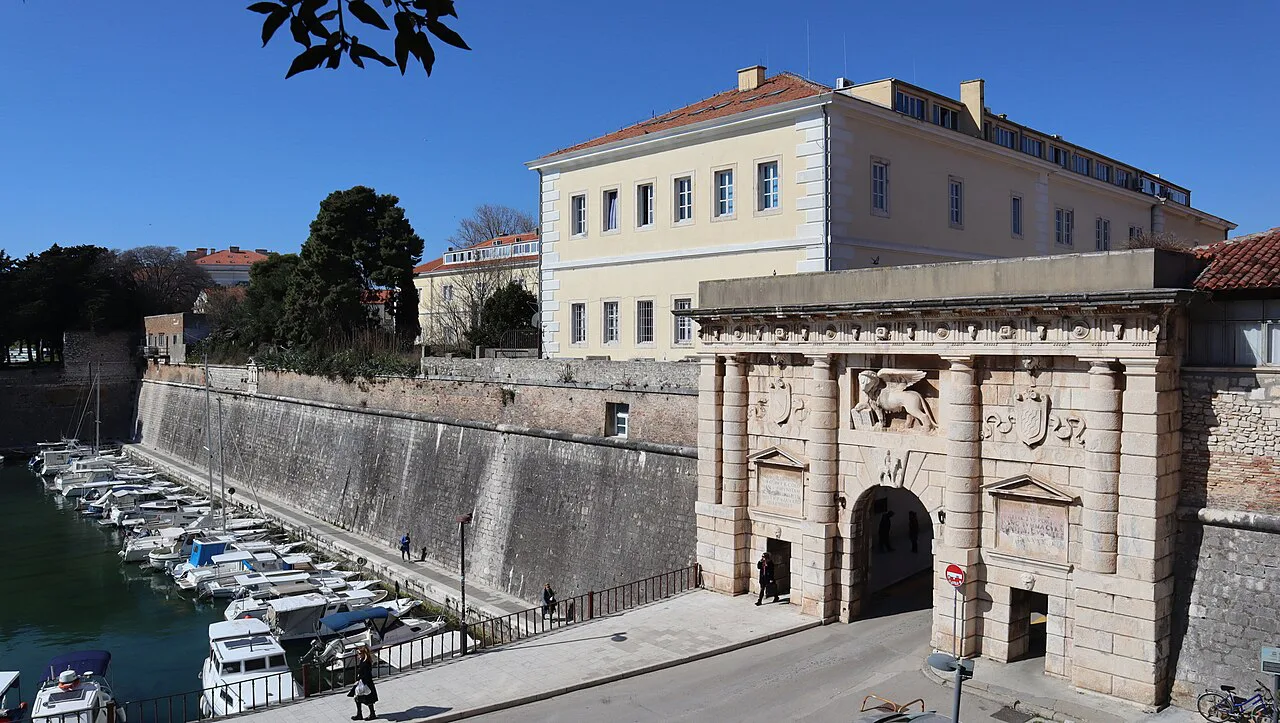 The Land Gate and city walls beside the harbour in Zadar