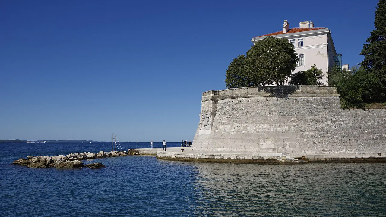 A stone bastion of the old city walls by the sea in Zadar
