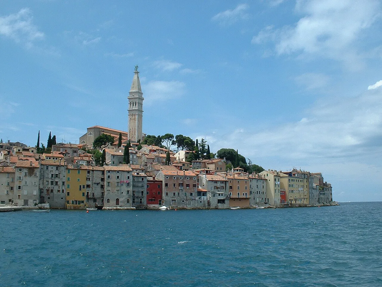 The old town of Rovinj and its bell tower seen from the sea