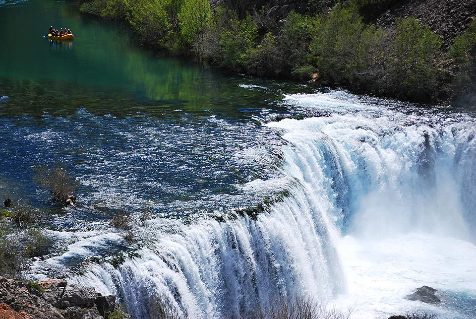 A wide waterfall on the Zrmanja river seen from above, Dalmatia